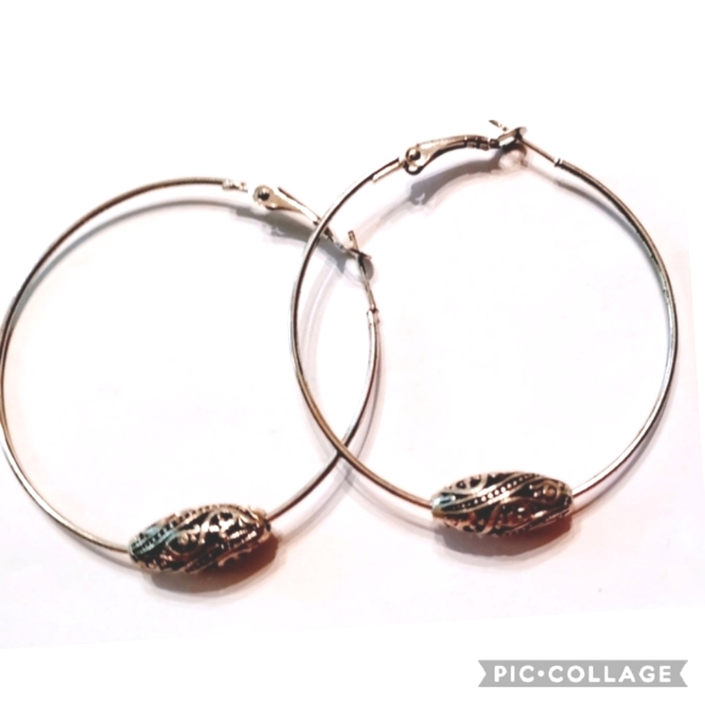 Silvertoned beaded hoops,light pretty new